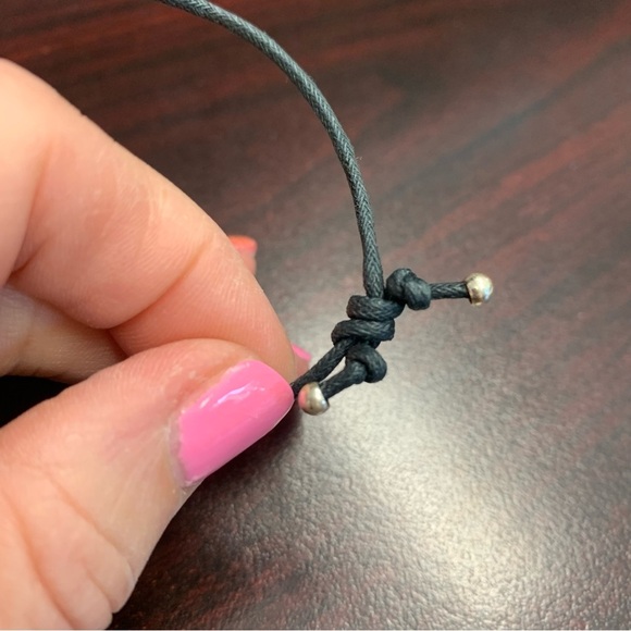 Avon adjustable cord necklace with silvertone disk pendant 22” long NIB - Picture 2 of 5